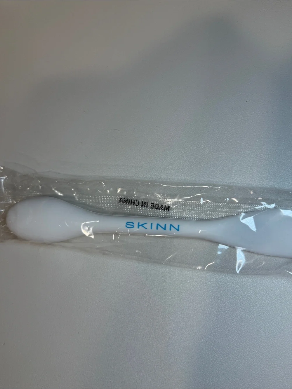 SKINN pore polishing wand, SKINN Double-ended Face Massage Brush